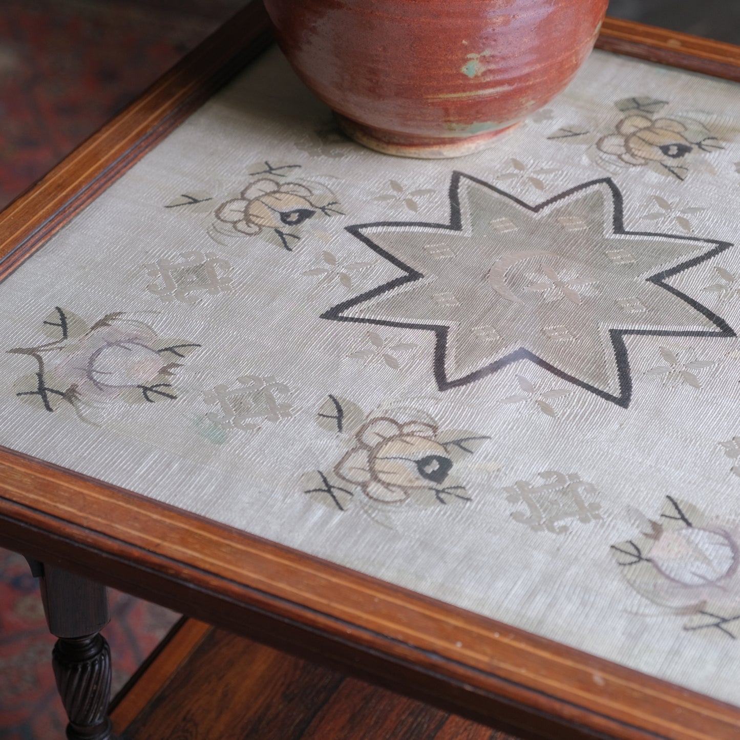 Mahogany side lamp table - embroidery under glass