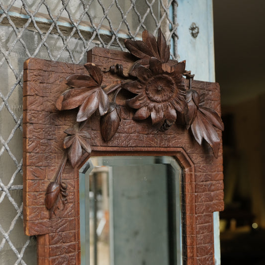Mirror in Ornately Carved Wooden Frame